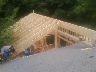 Framing a new roof addition that ties into an existing shingle roof in Diamond Bar